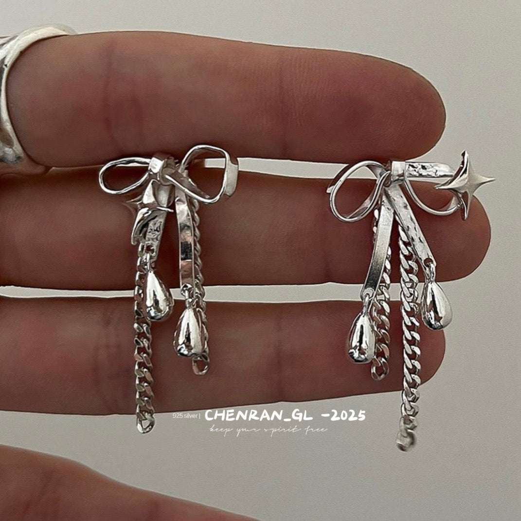 Four-pointed star water drop pendant and irregular bowknot stud earrings