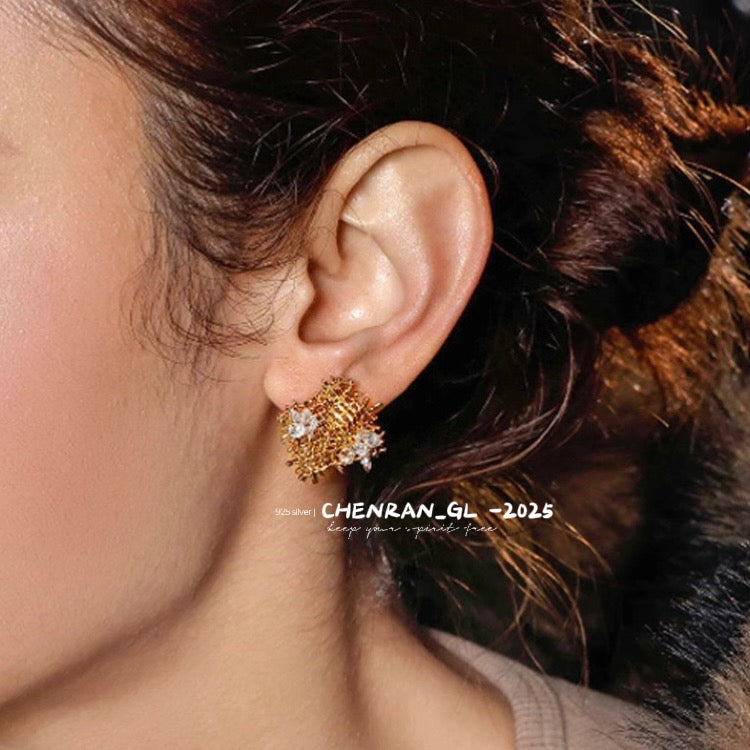 Irregularly woven zircon stud earrings