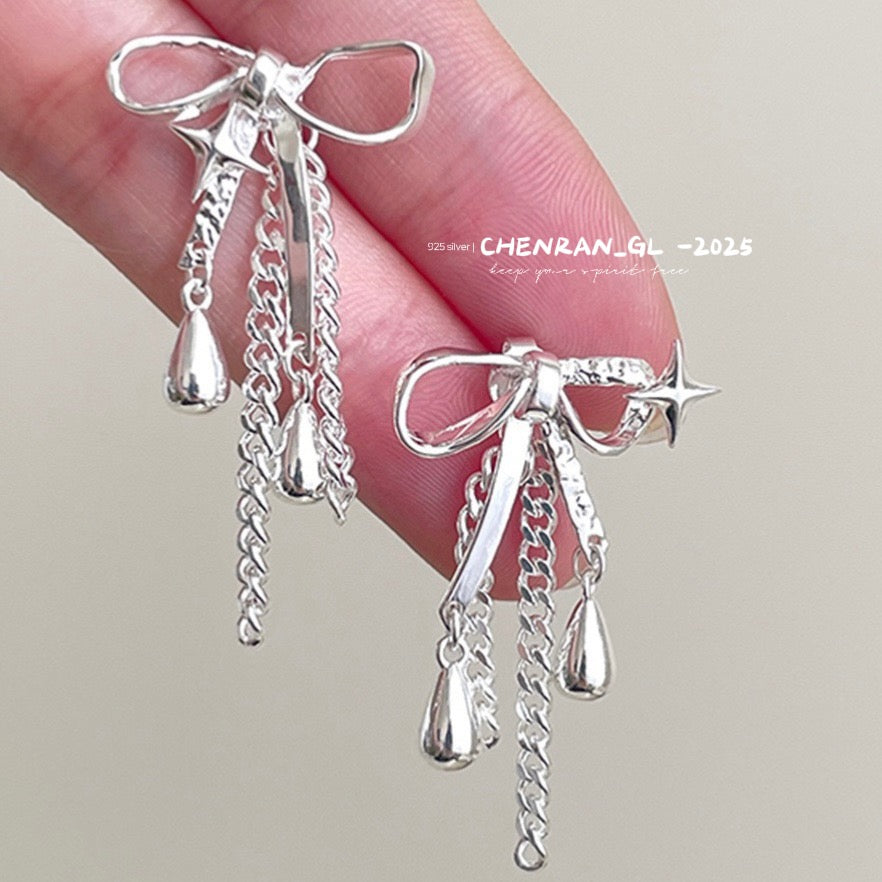 Four-pointed star water drop pendant and irregular bowknot stud earrings