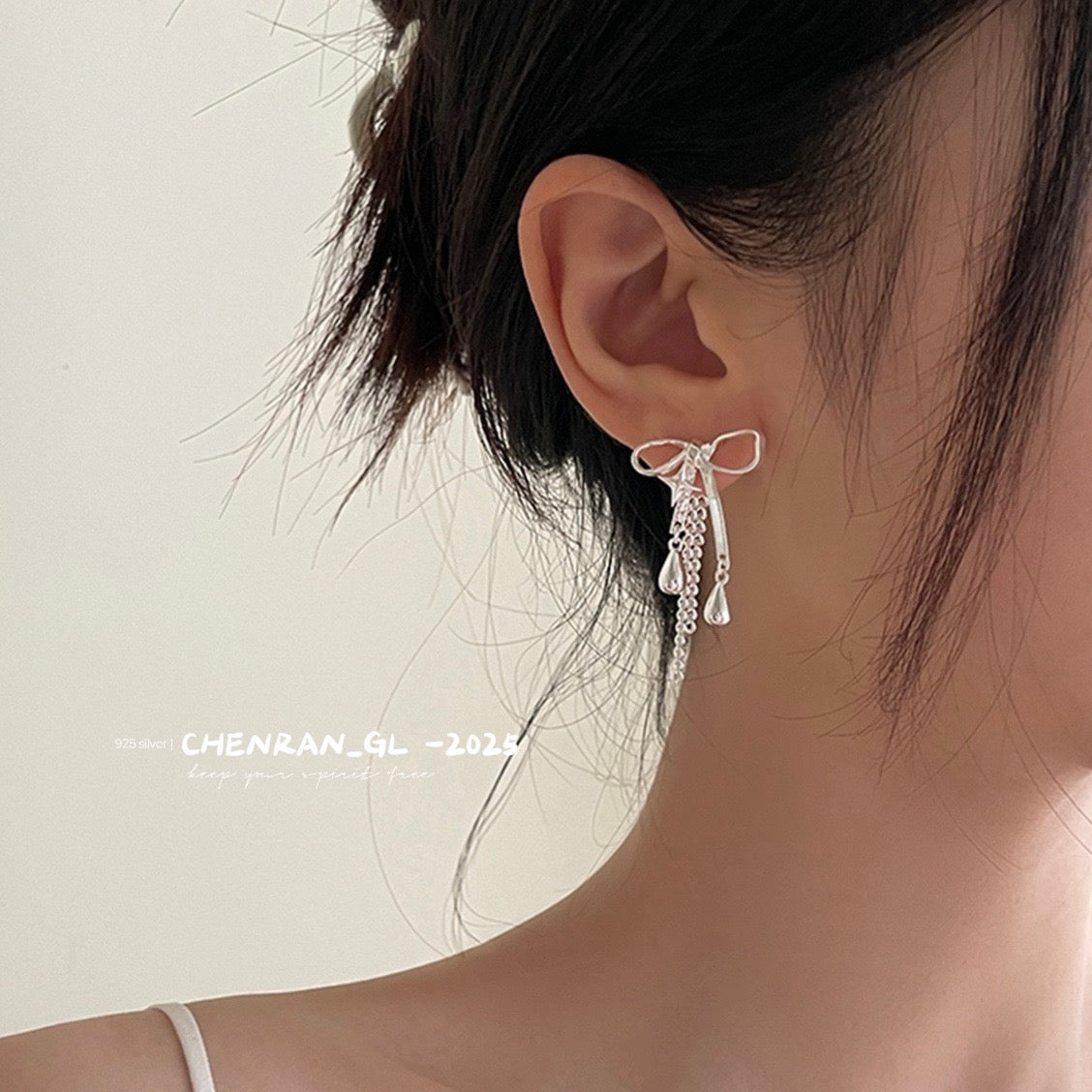 Four-pointed star water drop pendant and irregular bowknot stud earrings