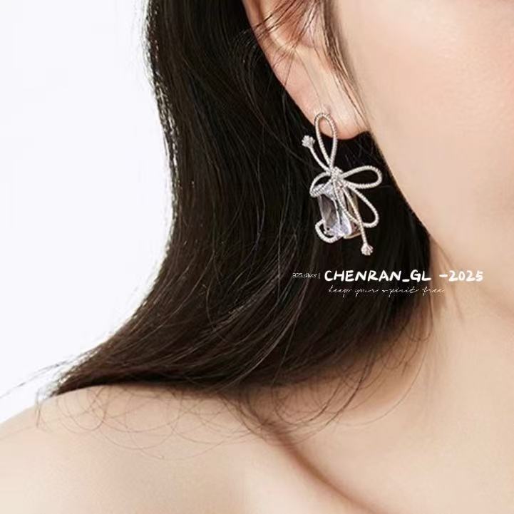 Woven and Twisted Bow Zircon Earrings