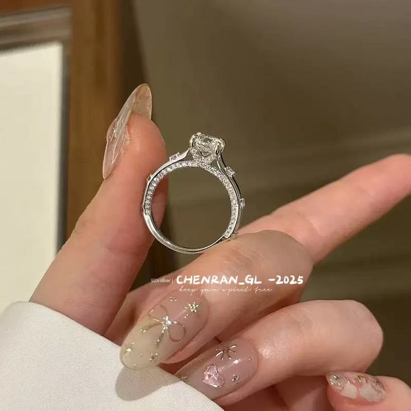 925 silver four-prong round diamond ring