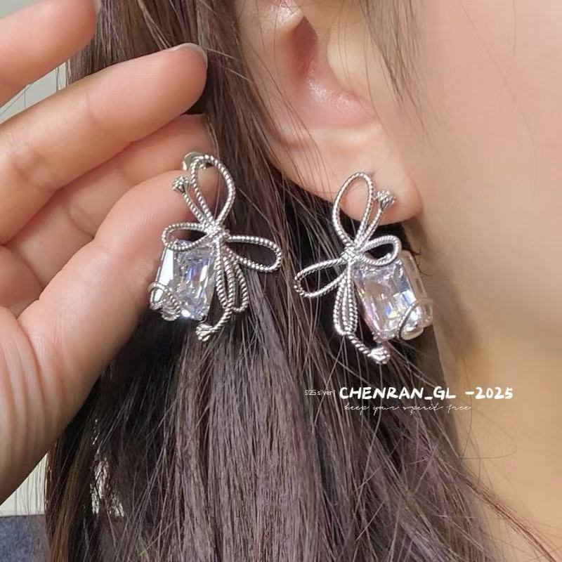 Woven and Twisted Bow Zircon Earrings