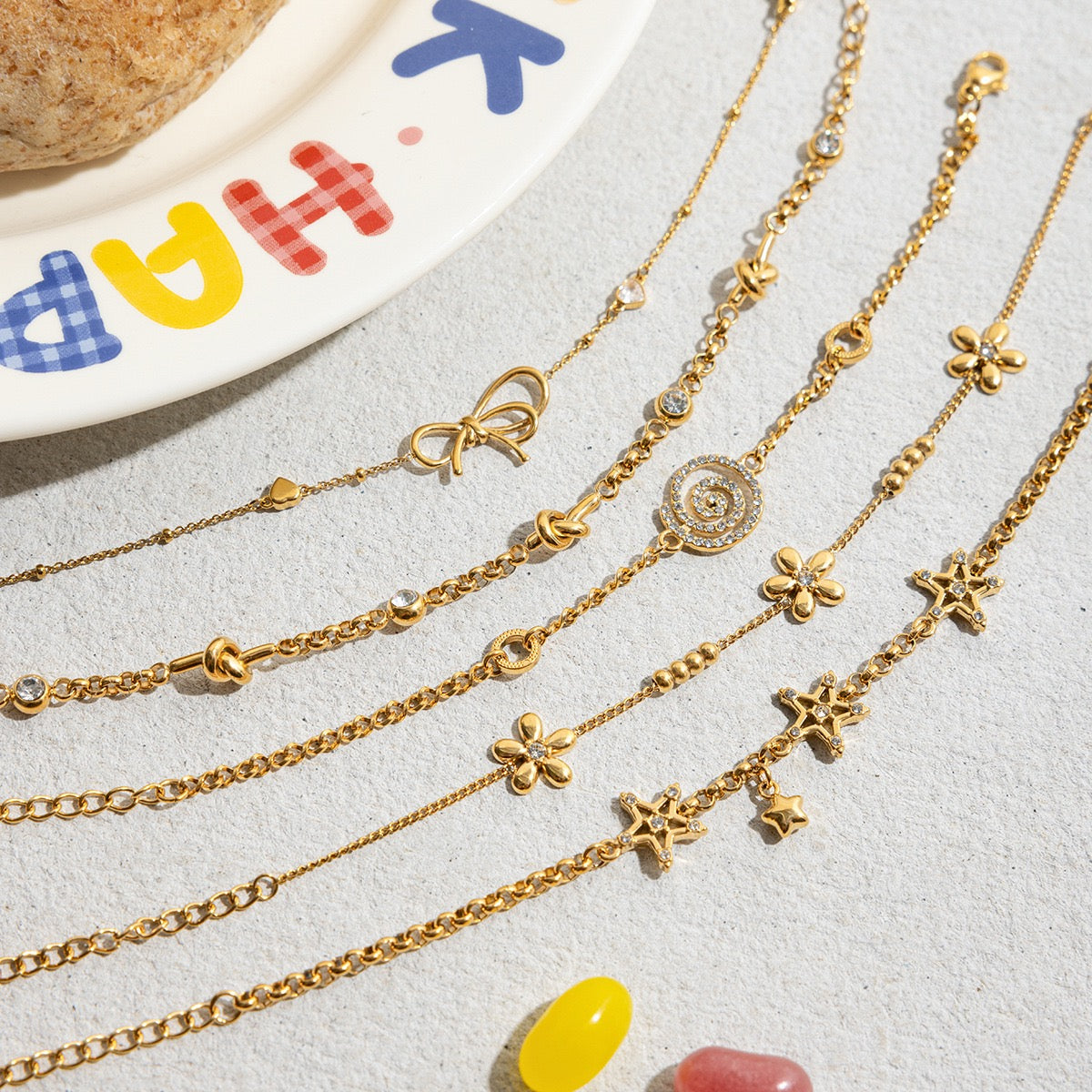 Bow, small flower, swirl stainless steel zirconia bracelet