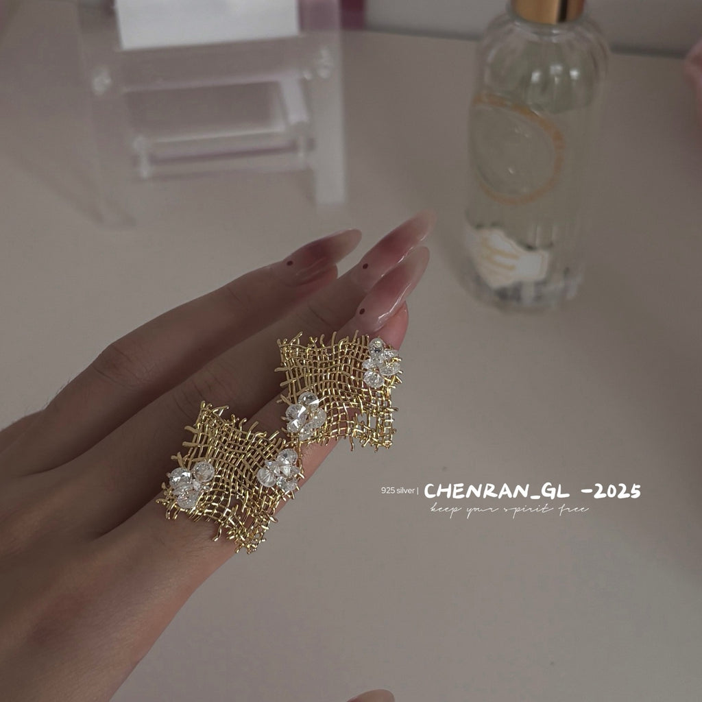 Irregularly woven zircon stud earrings