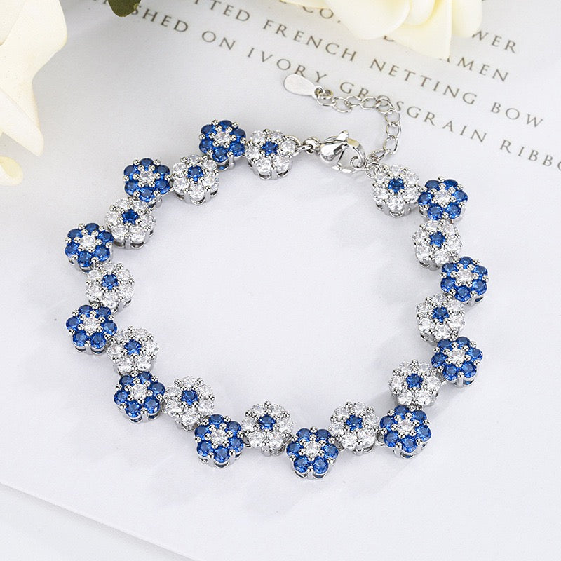 Blue spinel and zircon flower necklace and bracelet set